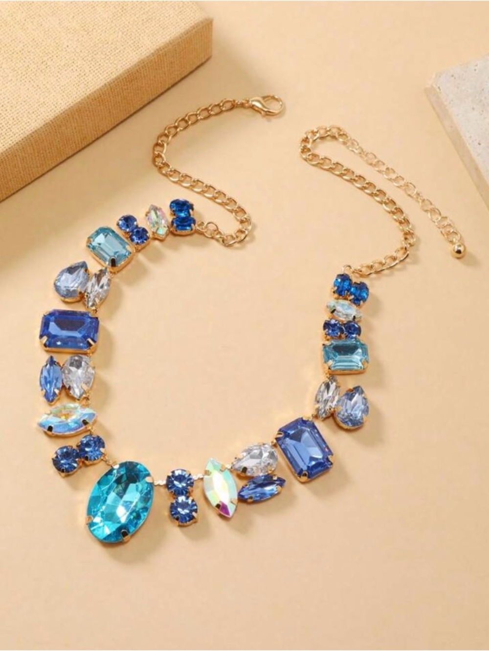 Gold-Chain Statement Necklace with Blue Crystal Accents